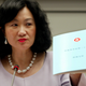 Hong Kong's Secretary for Security Regina Ip holds a consultation document on a planned anti-subversion law during a news conference in Hong Kong September 24, 2002. The territory unveiled the proposals on Tuesday that rights groups fear could pose the most serious threat to civil liberties since this former British colony returned to Chinese rule.